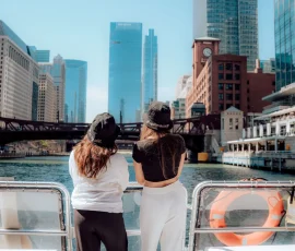 Group celebrating aboard a big boat charter in Chicago