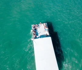 Big boat charter navigating near the Chicago harbor