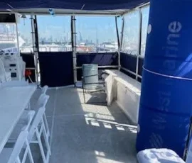 Covered interior deck of a big boat rental in Chicago