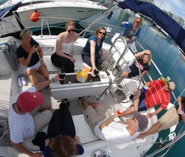 Group celebrating aboard a luxury sailboat in Chicago Harbor