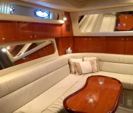 Wide view of luxury yacht salon with leather seating