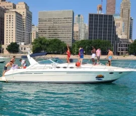 Premium private yacht anchored on Lake Michigan with guests enjoying a luxury Chicago yacht charter
